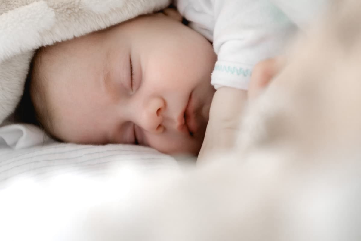 Baby smiling during a lifestyle portrait session