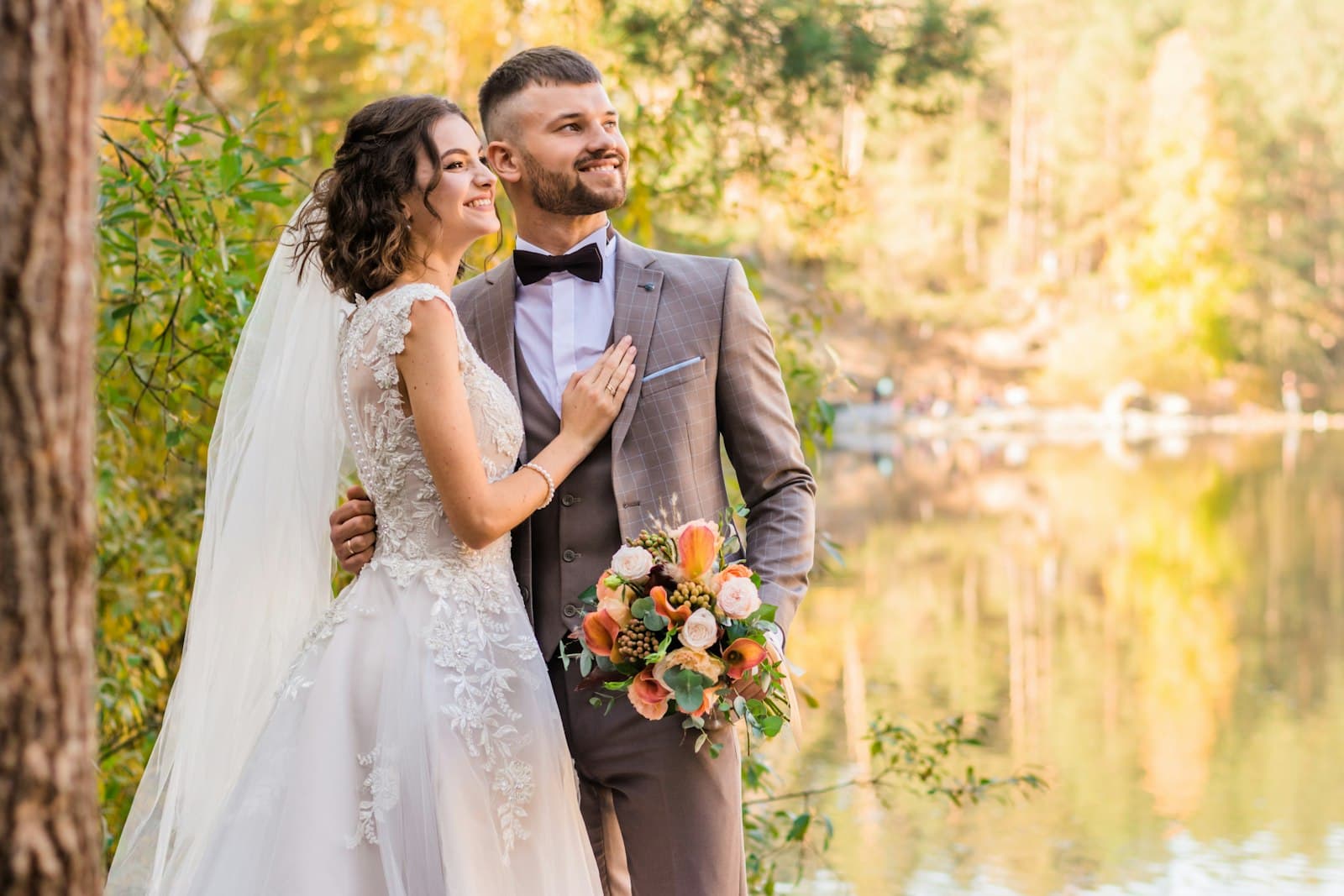 Couple embracing during golden hour